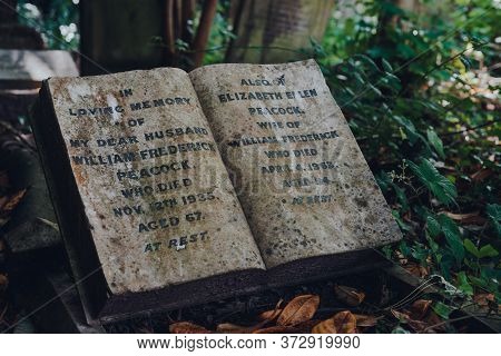 London, Uk - June 16, 2020: Book-shaped Tombstone For Wife And Husband Inside Hampstead Cemetery, A 