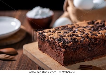 Chocolate Flavor Taiwanese Traditional Sponge Cake (taiwanese Castella Kasutera) On A Wooden Tray Ba