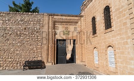 Midyat, Mardin, Turkey - January 2020: Entrance Door Of Mor Gabriel Deyrulumur Monastry Is The Oldes