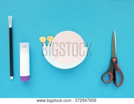 Step By Step Childrens Cardboard Crafts - Colored Swinging Snail. Scissors, Glue, Paper Sheets. Set 