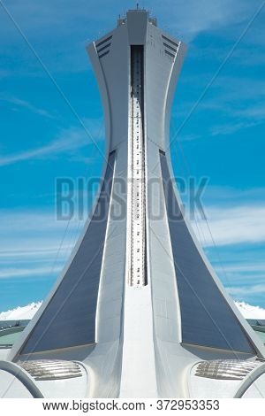 MONTREAL, CANADA- AOUT 10, 2018:  Olympic Stadium for 1976 Games and Biodome, one of four facilities that make part of the largest natural science museum complex  in Montreal, Canada.