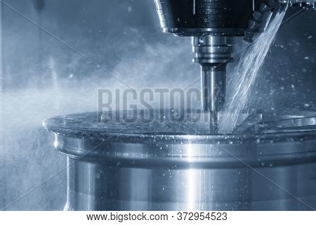 The Multi-axis Machining Center Cutting The Magnesium Alloy Wheel By Solid End Mill Tools. The Hi-te