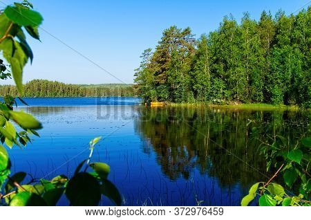 Scenes Of The Beautiful Siljan Lake And Its Rural Surrounding On A Sunny Summer Morning.