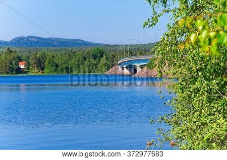 Scenes of the beautiful Siljan Lake and its rural surrounding on a sunny summer morning.