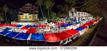 Luang Prabang Night Market Tents In Front Of Haw Pha Bang Temple, Louangphabang Province, Laos