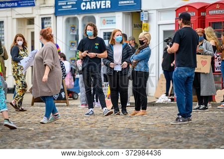 Richmond, North Yorkshire, Uk - June 14, 2020: Black Lives Matter Protesters On Cobbles In Richmond 