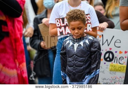 Richmond, North Yorkshire, Uk - June 14, 2020: A Young Superhero At A Black Lives Matter Protest In 