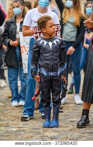 Richmond, North Yorkshire, Uk - June 14, 2020: A Young Superhero At A Black Lives Matter Protest Wit