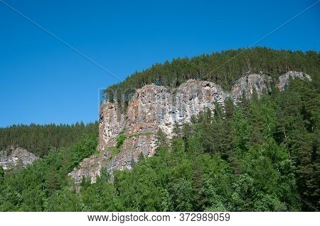 Large Rock With Trees At The Top