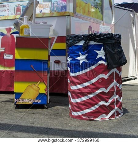 Sacramento, California, U.s.a. 23 July 2017. Trash Can Wrapped In The American Flag. The Fair Is Ann