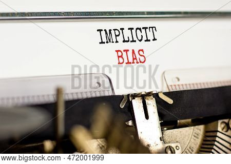 Implicit Bias Symbol. Concept Words Implicit Bias Typed On White Paper On Old Retro Typewriter. Beau