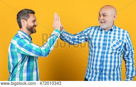 Five Of Two Generation Friends On Background. Photo Of Two Generation Friends Giving Five With Hands