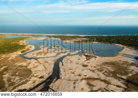 Rivers And Lakes In The National Park Against The Background Of Blue Sky And Ocean During Sunset. Sr