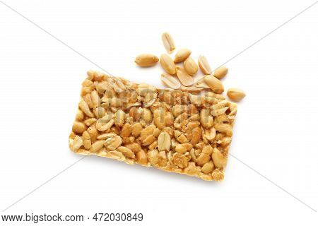 Tasty Kozinaki Bar And Peanuts Isolated On White, Top View