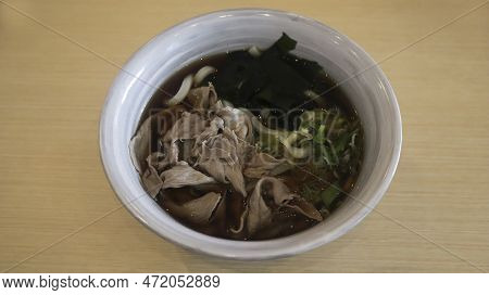 A Bowl Of Niku Udon, Soup Noodles With Sliced Beef.