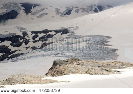 Glacier Pasterze With Icefall Hufeisenbruch, Crevasses And Mountain Snow Panorama In Glockner Group,