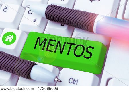 Sign Displaying Mentos. Business Idea Style Of Jamaican Folk Music Based On Traditional Dance Rhythm