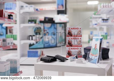 Cardiology Pills Pacakages Standing On Table In Empty Health Care Facility, Pharmacy Equipped With M