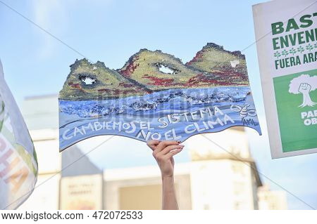 Buenos Aires, Argentina; March 3, 2023: Global Climate Strike. Hand Holding A Poster With The Text L