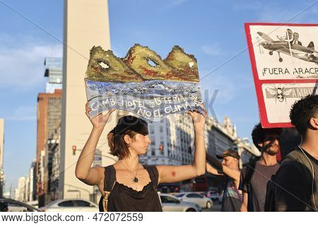 Buenos Aires, Argentina; March 3, 2023: Global Climate Strike. Young Activist Holding A Poster With 