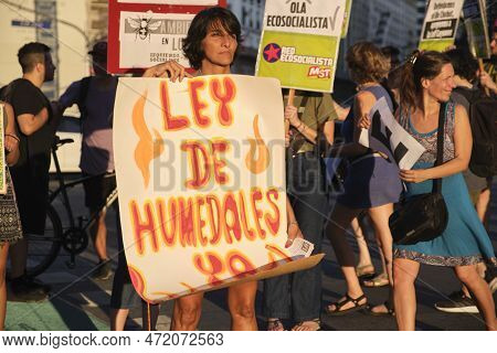Buenos Aires, Argentina; March 3, 2023: Global Climate Strike. Activist Holding A Poster Demanding E