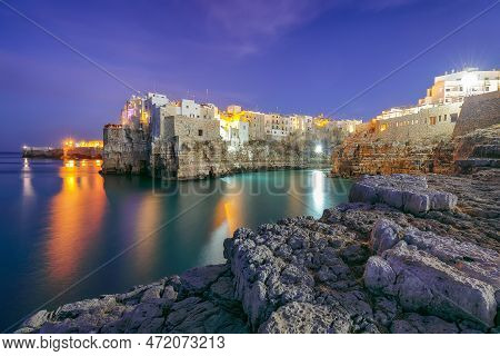 Fantastic Night Scene At Cala Paura Gulf With Bastione Di Santo Stefano In Village On The Rocks Poli