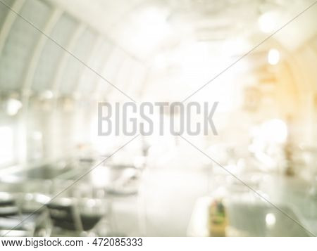 White Blurred Background Bright Restaurant Shopping Mall Silver Gray Lighting. Defocused Store Light