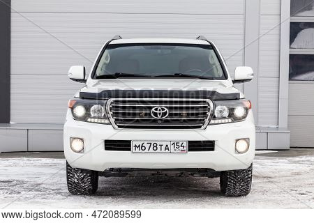 Novosibirsk, Russia - 04.03.2023: Front View Of Toyota Land Cruiser 200 J200 2013 Year White Color A