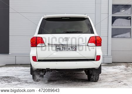 Novosibirsk, Russia - 04.03.2023: Rear View Of Toyota Land Cruiser 200 J200 2013 Year White Color Af
