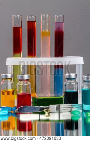 Test Tubes And Bottles With Various Colored Liquids. Scientific Lab Medicine Reserarch.