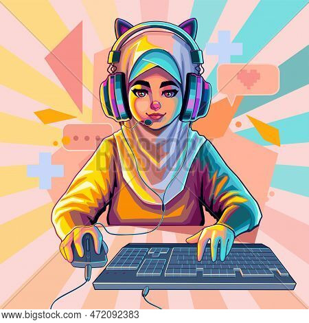 Muslim Girl Gamer Or Streamer With Cat Ears Headset Sits In Front Of A Computer