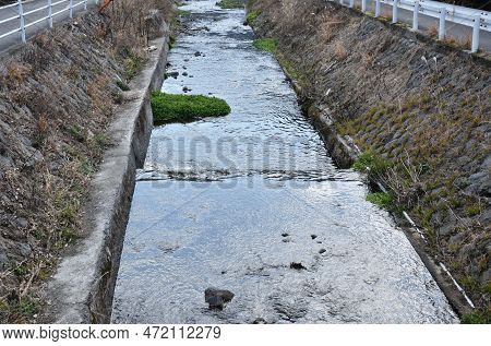 Flush Way For Drain Water And Protect Flooding In Street At Yufuin Japan