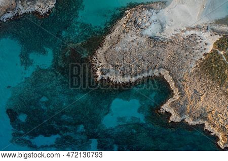 Aerial Drone View Of The Rocky Coastline Island In Winter. Turquoise Blue Water, Nissi Beach Bay Ayi
