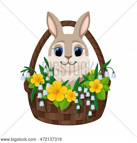 Cute Easter Bunny Sitting In Basket With Yellow Flowers And Lilies Of The Valley. Rabbit For Easter 