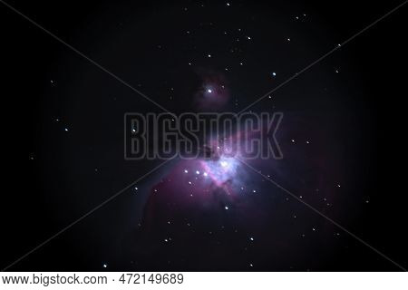 Night Sky Background With Bright Orion Nebula On Black Sky With Stars. Astro Photo On Winter Night W