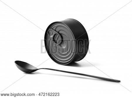 Black Matte Round Closed Tin Can And Black Spoon On A White Background Isolated, Tinned Food, Canned