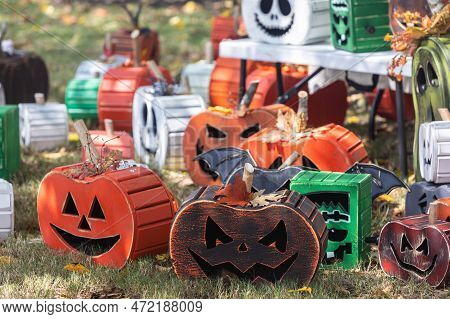 Suwanee, Ga / Usa - September 18, 2022:  Unique Halloween Pumpkins Made Out Of Wood Sit On Display A