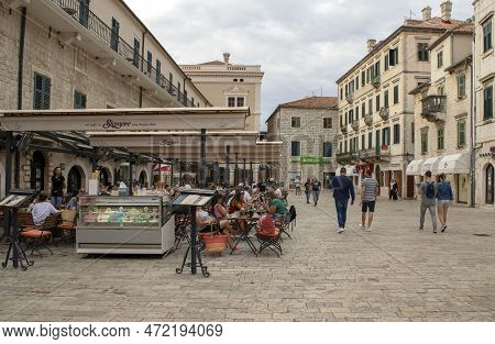 Montenegro - Kotor: September 9, 2021: View Of Old City Of Kotor With Many Tourists And Cafe During 