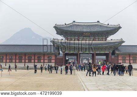 A Beautiful Pagoda And People Walking At The Entrance To A Popular Park In An Asian City. History, R