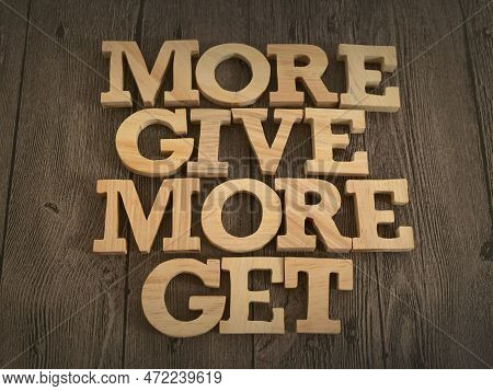 More You Give More You Get, Text Words Typography Written With Wooden Letter, Life And Business Moti