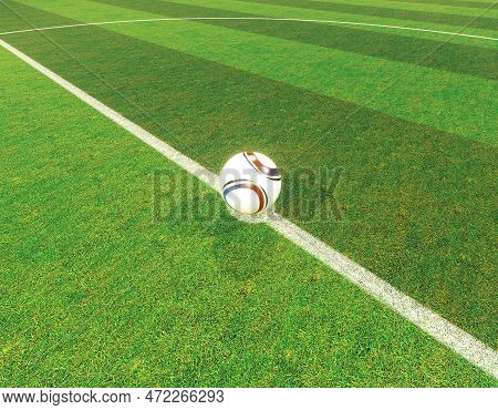A Soccer Ball On The Centre Line Of A Soccer Stadium With Goals On A Marked Green Grass Pitch Under 