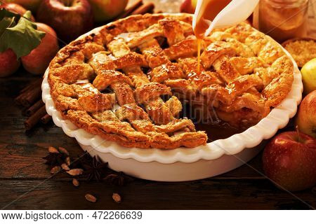 Apple Pie Decorated With Lattice With Caramel Sauce, Fall Baking Concept