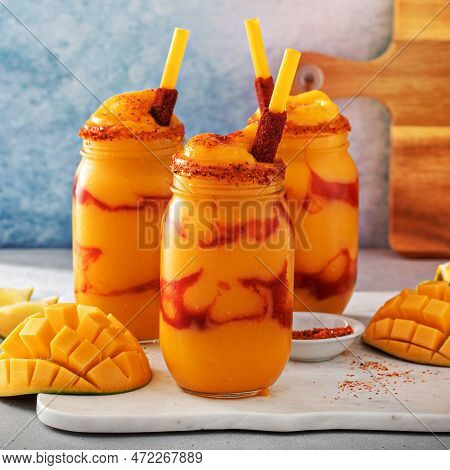 Mangonada Mexican Mango Smoothie With Chamoy Sauce And Lime Seasoning