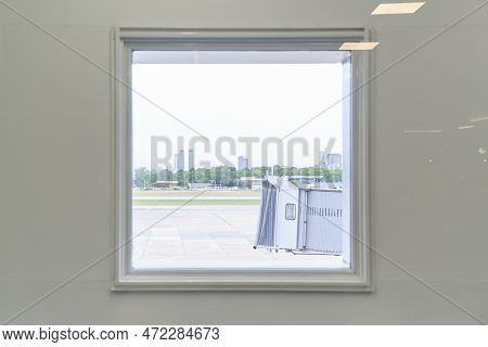 Buenos Aires, Argentina, November 18, 2022: Boarding Bridge As Seen From A Window Of The Jorge Newbe