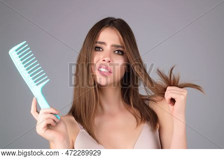 Hair Loss Woman With A Comb And Problem Hair. Hairloss And Hairs Problems. Sad Girl With Damaged Hai
