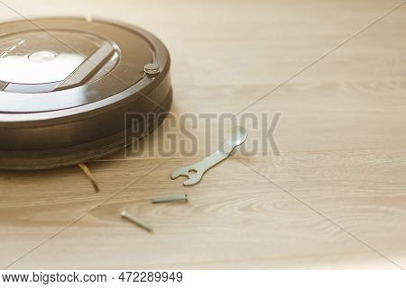 Robot Vacuum Cleaner On Laminate Wood Floor, Smart Robotic Automate Wireless Cleaning Technology Mac