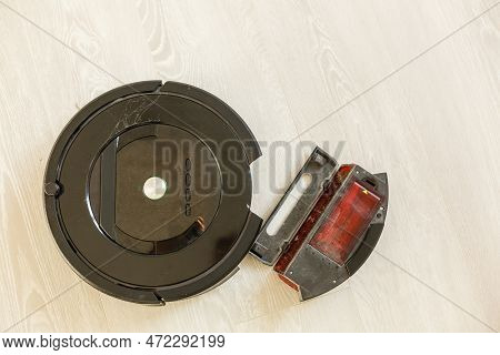 Robot Vacuum Cleaner On Laminate Wood Floor, Smart Robotic Automate Wireless Cleaning Technology Mac