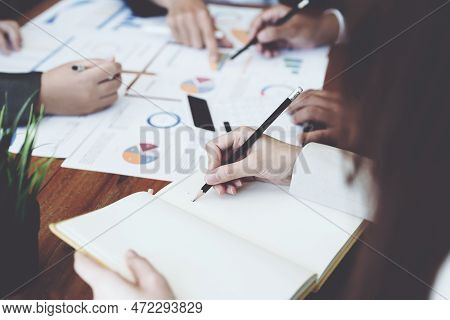 The Companys Businessmen Meet And Discuss To Plan A Marketing Strategy And Come To A Conclusion On H