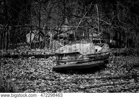 Abandoned Bumper Cars In The Amusement Park Of Pripyat City In Chernobyl Exclusion Zone, Ukraine. Bl
