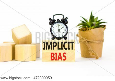 Implicit Bias Symbol. Concept Words Implicit Bias On Wooden Block. Beautiful White Table White Backg
